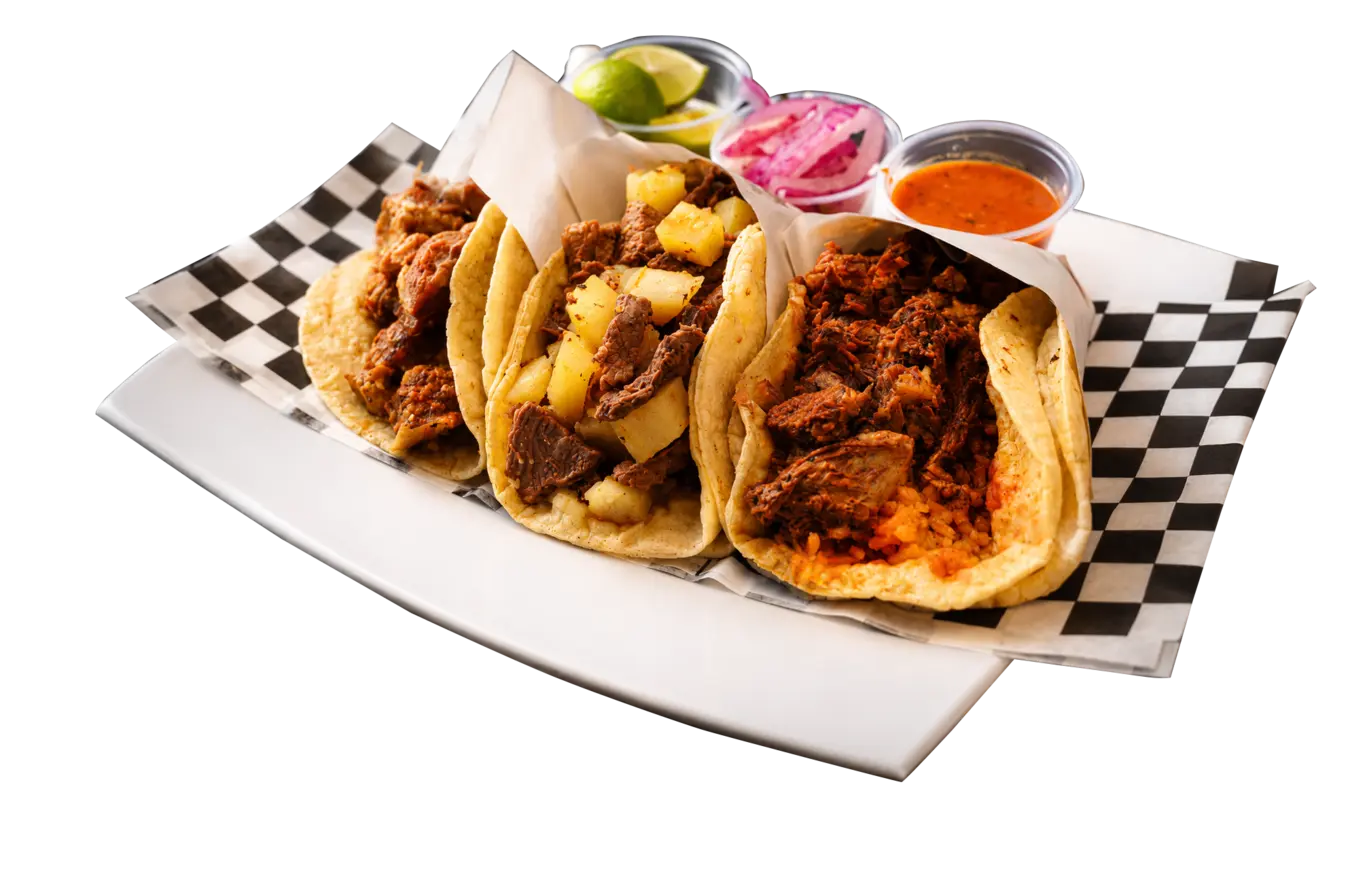 Orden de tacos de guisado de Tacos Los Dorados